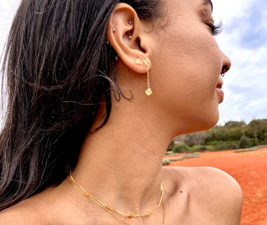 modern mindful woman wearing australian jewelry company Sticks and Stones Creative crystal jewelry for self-love and empowerment