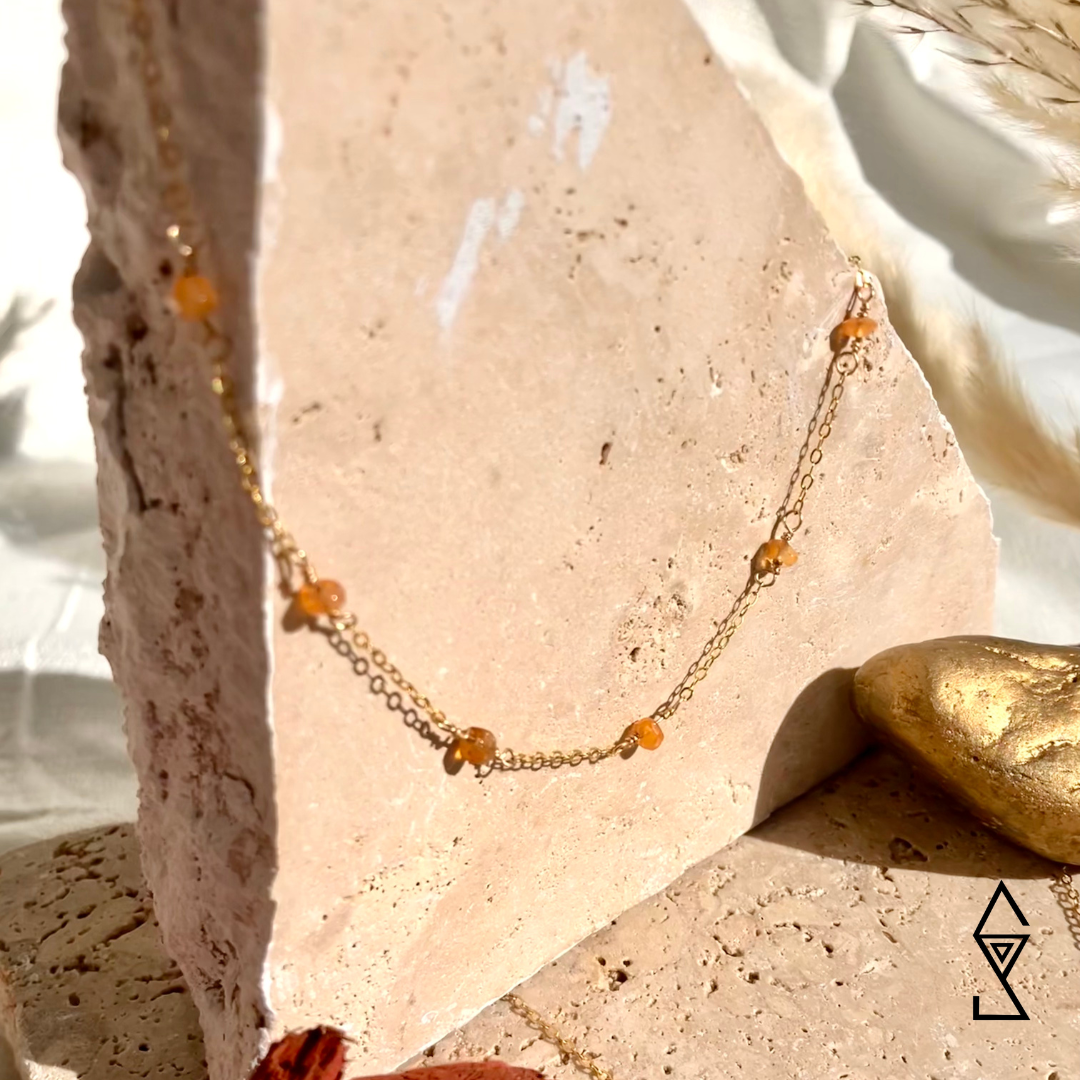 Handmade crystal jewerly collection for anxiety trauma healing and grounding featuring carnelian crystals