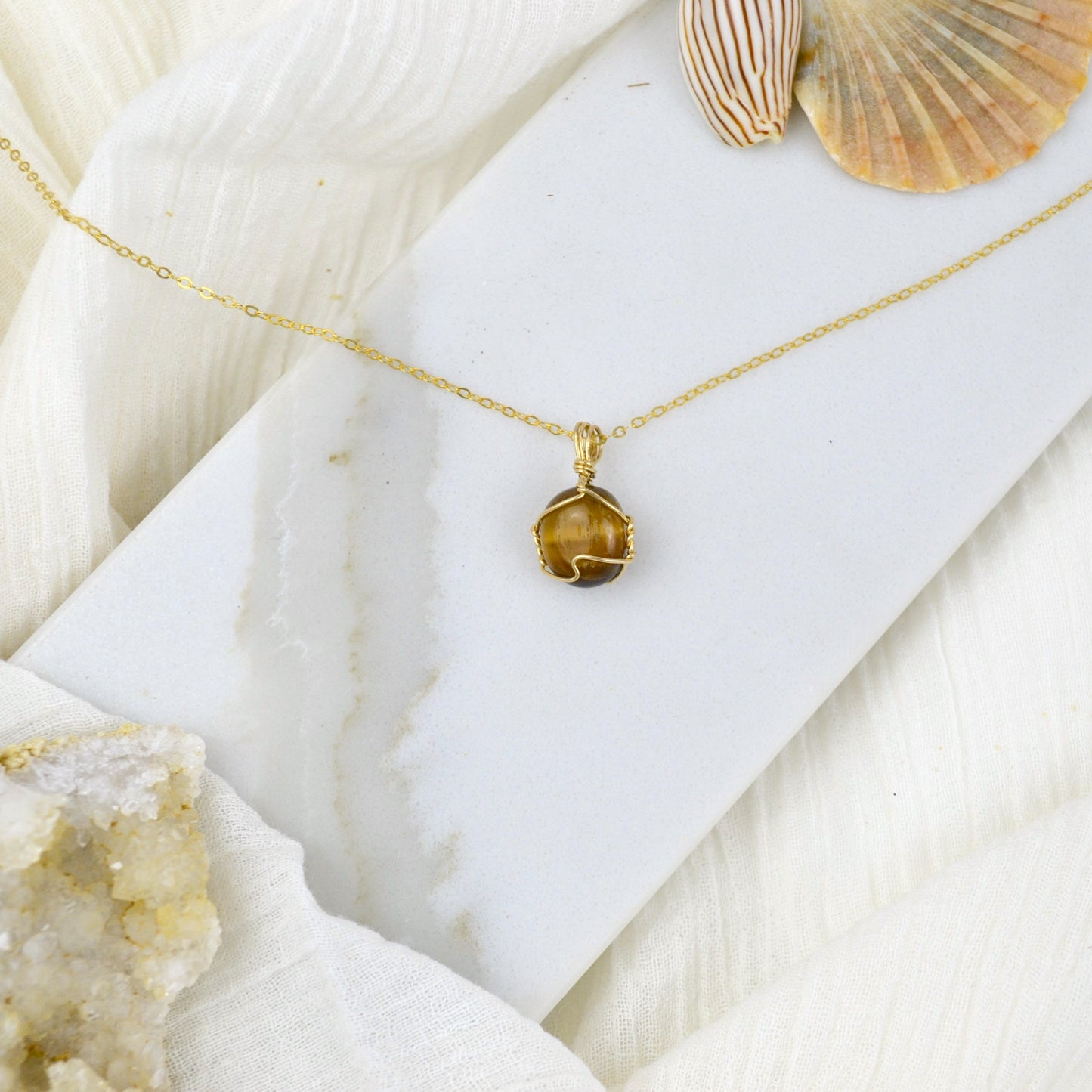 tiger eye jewelry handmade in Melbourne boutique crystal studio. Divine protection healing necklaces for wellness.
