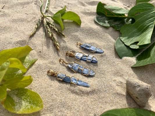 crystal care 101: How to cleanse, charge and program your crystals using natural sunlight to charge kyanite crystal necklaces