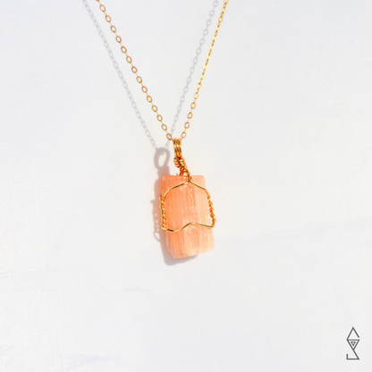 peach selenite crystal necklace meaning when worn as crystal jewelry