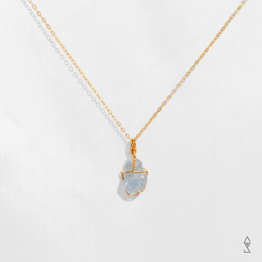 Blue Crystal Jewelry featuring Blue Caclite Crystal Necklace in 14K gold and Refined Silver. Shop Blue Calcite necklace Australia