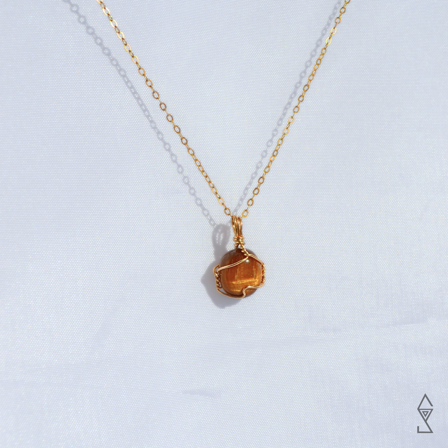 Tiger eye necklace with 14K gold wire wrap and dainty gold chain for a layered gemstone look