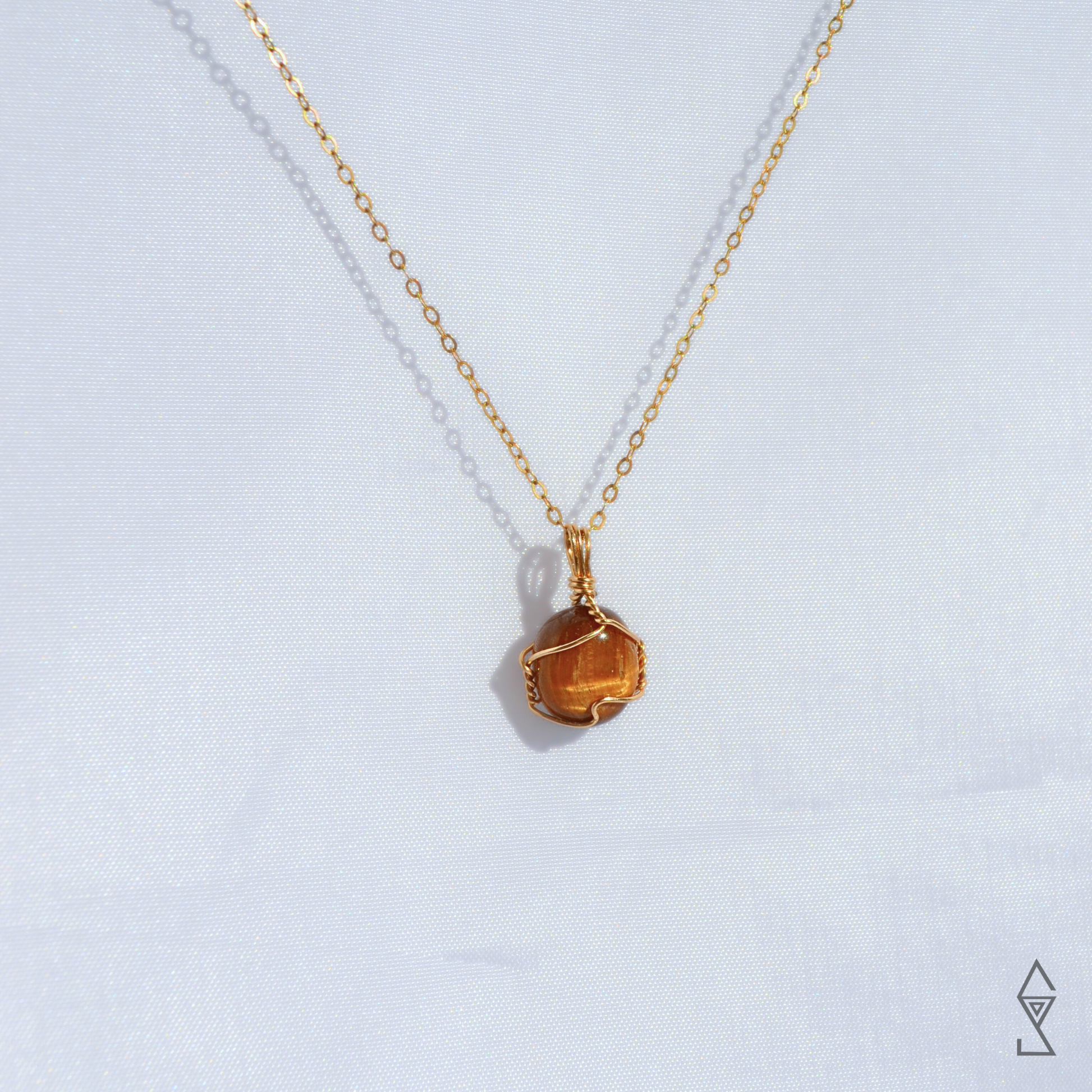 Tiger eye necklace with 14K gold wire wrap and dainty gold chain for a layered gemstone look