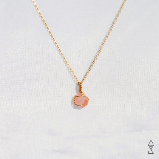 Rose Quartz Crystal Necklace in 14K gold for self love and compassion. Discover the Rose Quartz Jewelry Meaning.