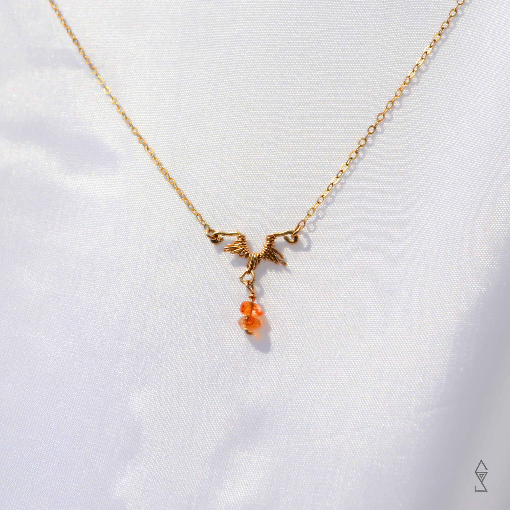 carnelian crystal necklace with 14K gold sun charm discover the carnelian jewelry meaning