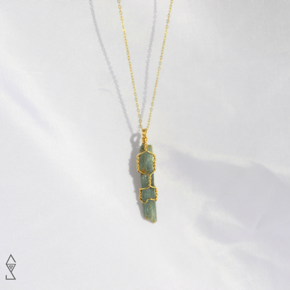 Blue green kyanite meaning and propertoes 14K gold chakra healing crystal necklace