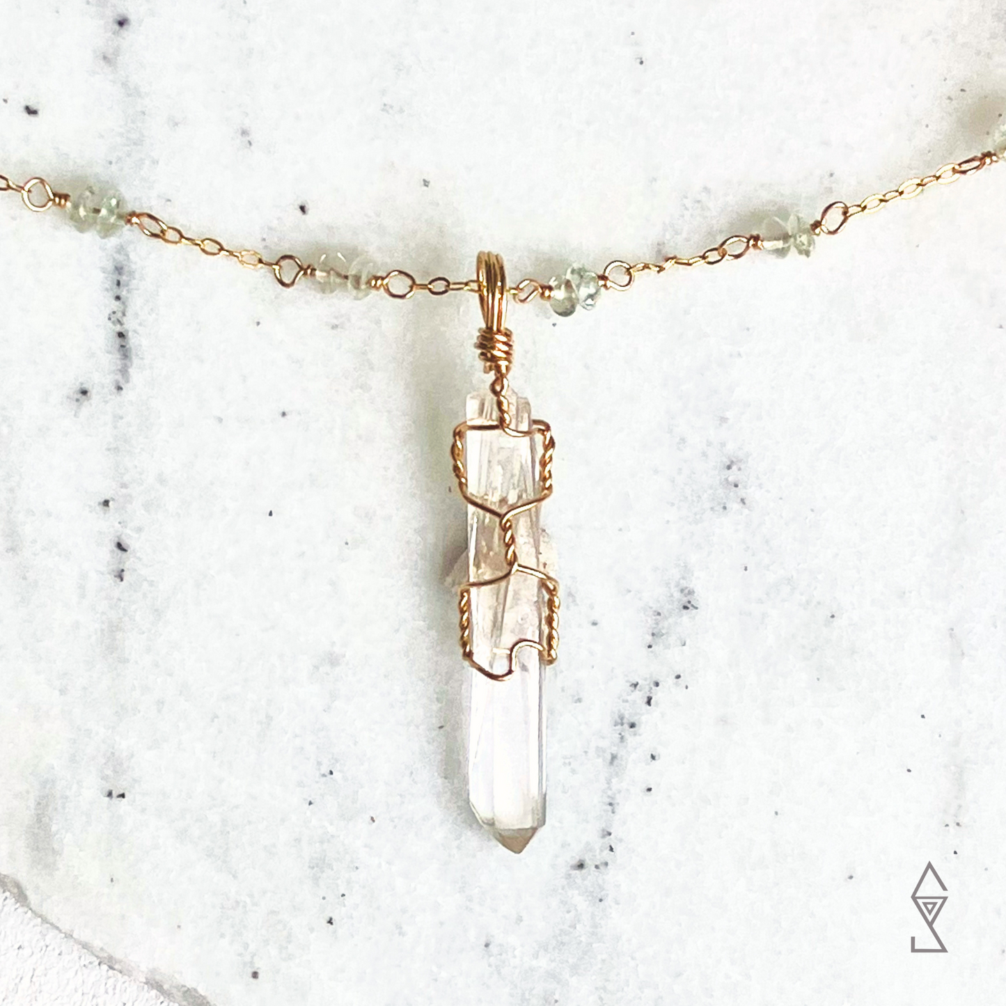 dainty crystal necklace with clear quartz pendant on beaded 14k gold chain