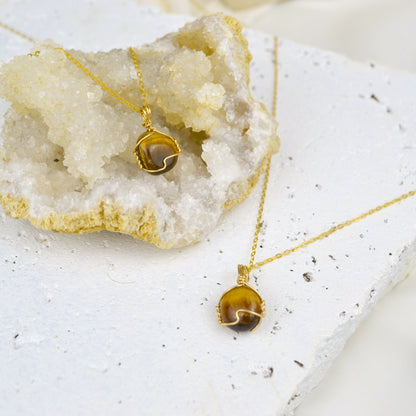 tiger eye crystal necklace for  protection. discover the tigers eye crystal meaning